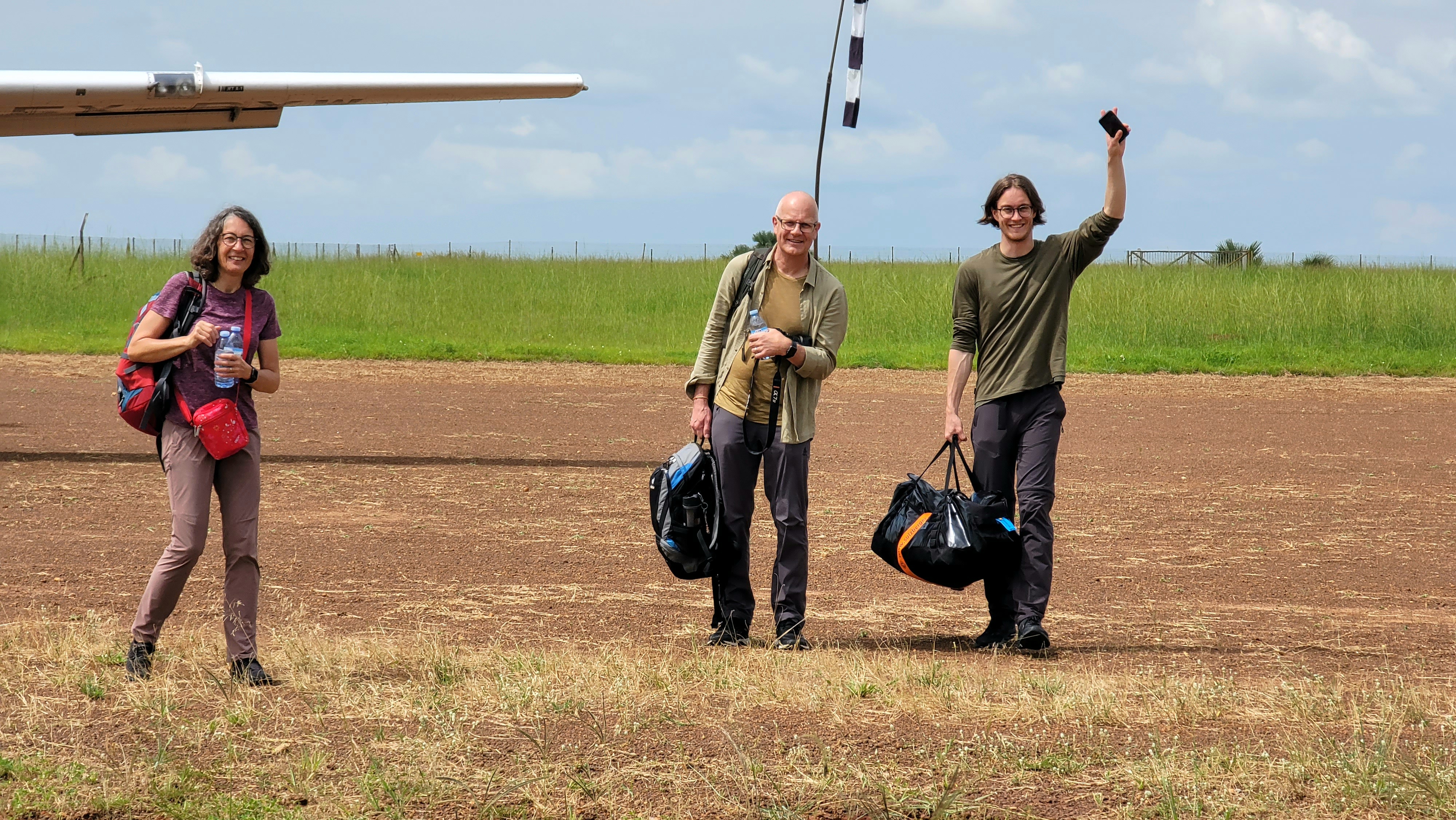 Happy travelers on safari